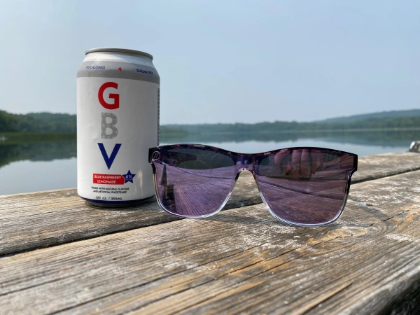 God Bless Vodka Can on a Dock with Sunglasses